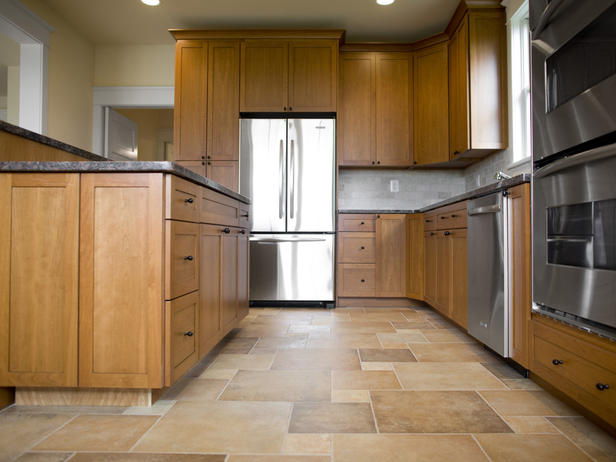 Kitchen with multi-colored ceramic floor tiles | Photo Source: Carolina Flooring Services