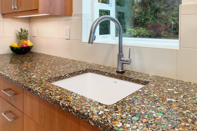 Recycled glass and other composite countertops are great for a sustainable remodel. | Photo Source: Sitka Projects