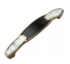 Schaub & Company Designer Pull made with brass, leather, and mother of pearl. | Photo Source: pullsdirect.com